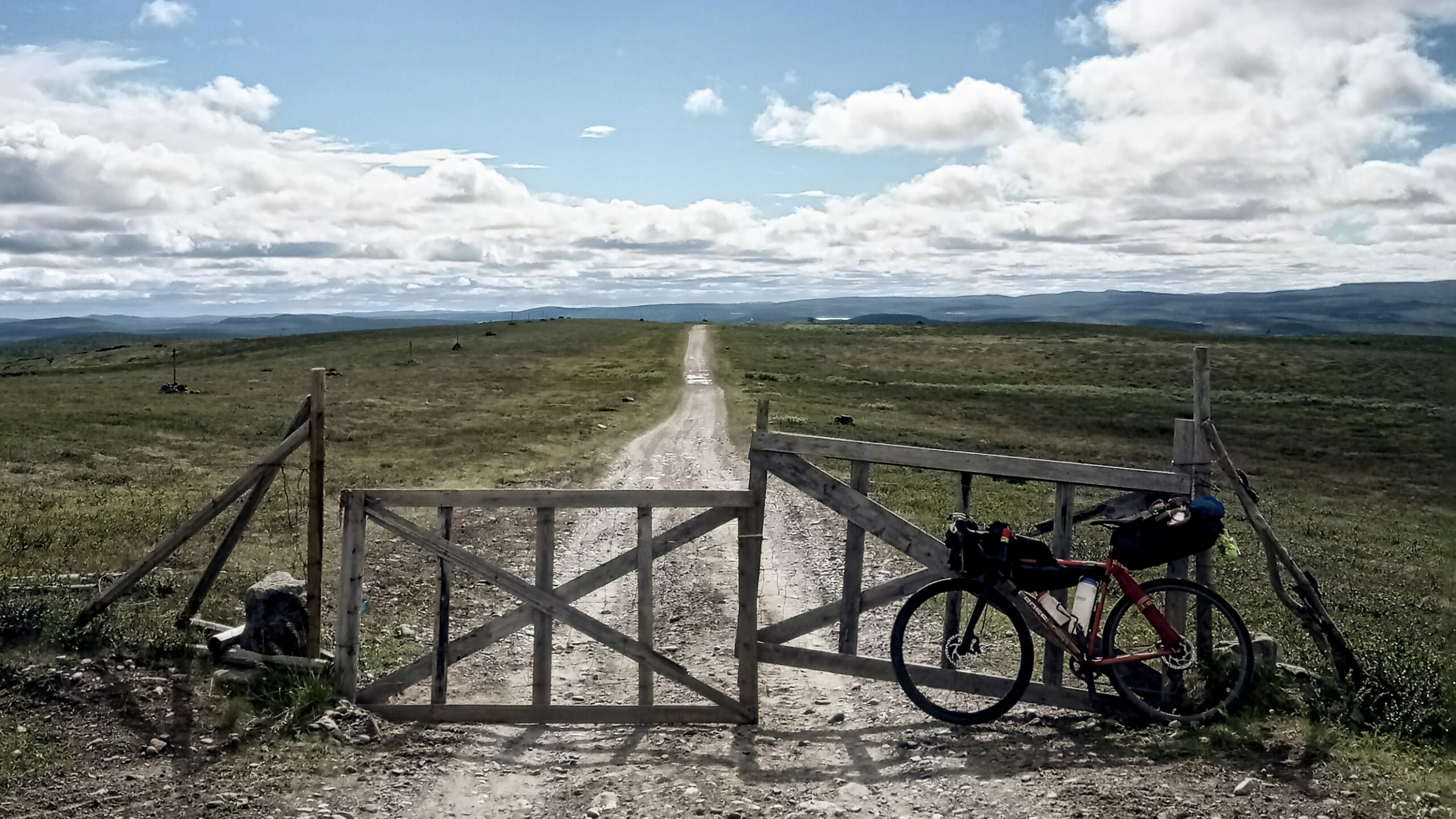 Karen cycling the Post Road gravel route from Alta in 2022